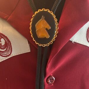 Western themed bolo tie.